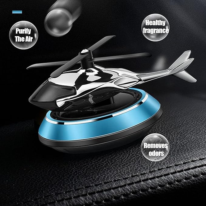 Solar-powered car fragrance diffuser helicopter design on dashboard